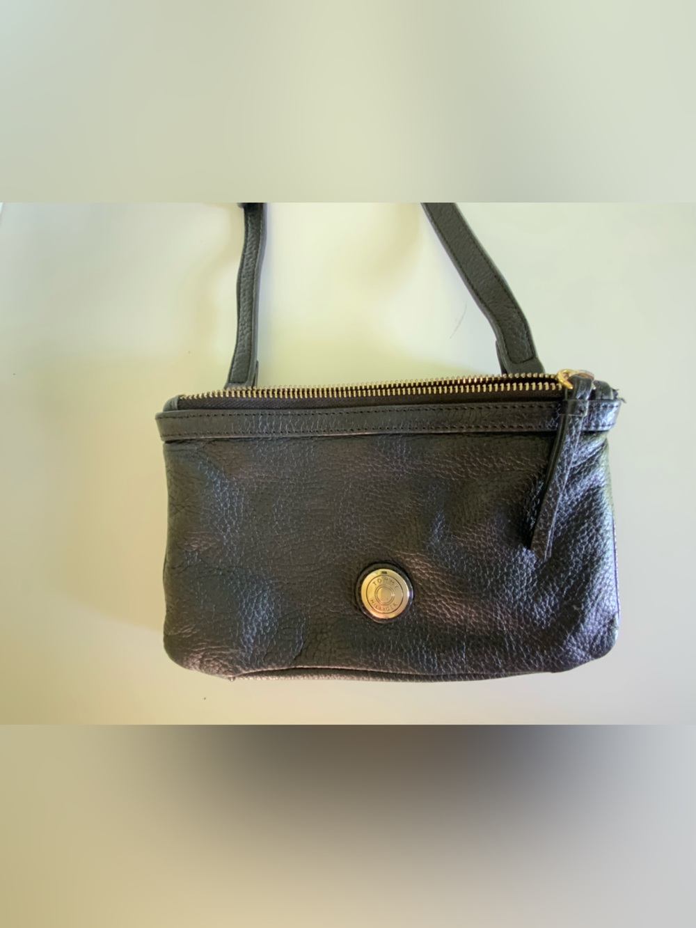 Tommy Hilfiger
Black Crossbody Bag with Gold Accent - Women.